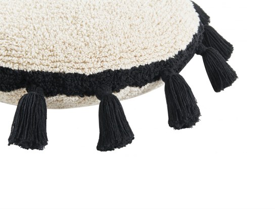 Cuscino rotondo con pon pon nero