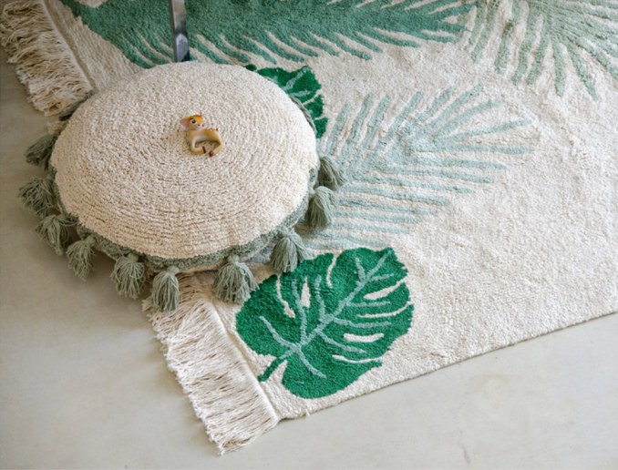Rond kussen met pompons Groen