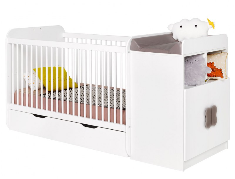 Lit bébé évolutif Madrid Blanc 70x140. Avec petite barrière pour que votre enfant monte seul dans son lit. Tiroir en option.