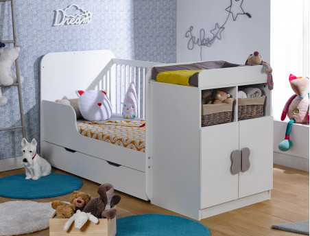 Lit bébé évolutif Madrid Blanc 70x140. Avec petite barrière pour que votre enfant monte seul dans son lit. Tiroir en option.