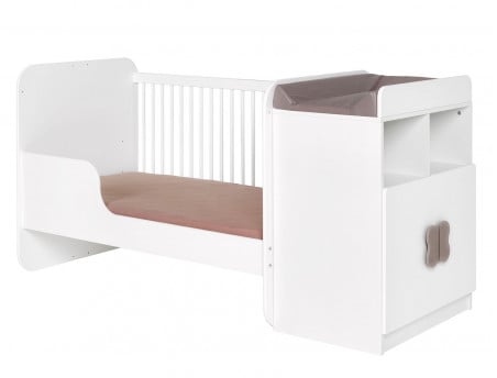 Lit bébé évolutif Madrid Blanc. Avec petite barrière pour que votre enfant monte seul dans son lit. Tiroir en option.
