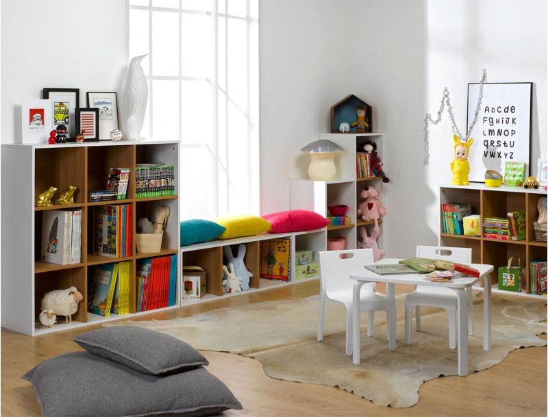 White and wood 3-compartment storage cube in a playroom