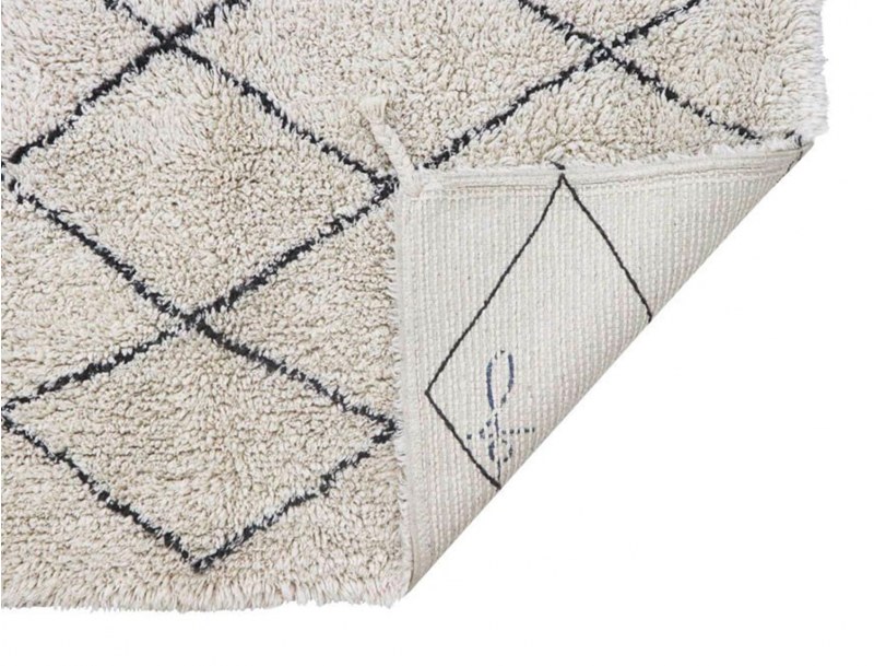 Small black and white diamond Berber rug