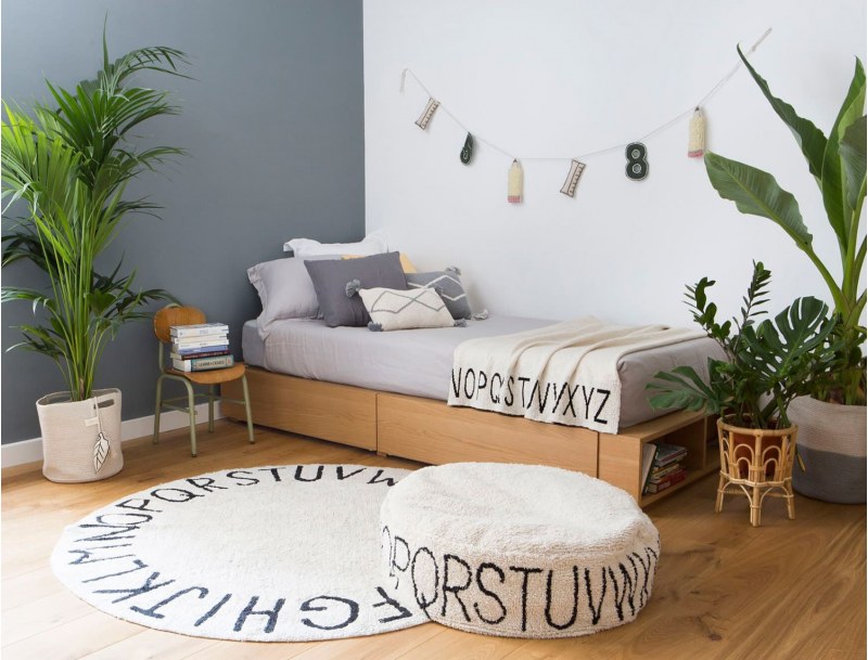 Nude Beige Alphabet round rug. Machine washable.