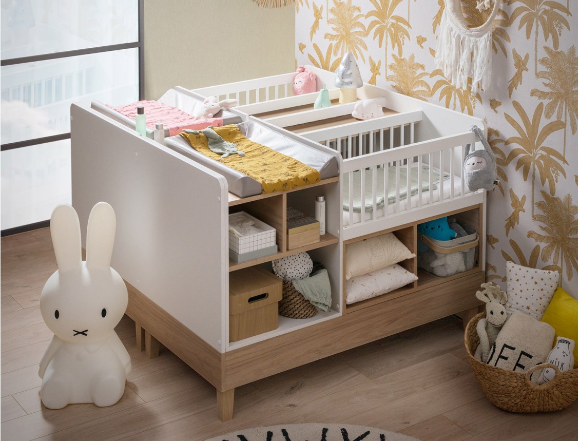 Evolutionair babybed voor tweeling met luiertafels en opbergruimte