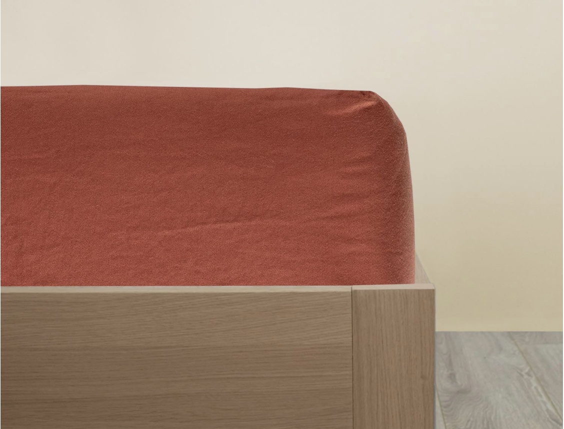 Terracotta fitted sheet 90x200 cm in organic cotton 80 threads.