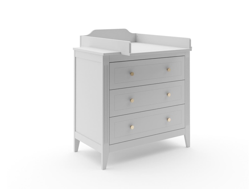 Piano fasciatoio Heritage grigio sul comò della stessa collezione.