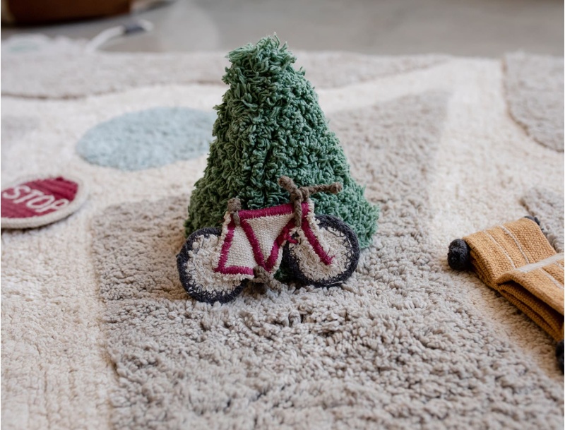 Toy bicycle on the rug