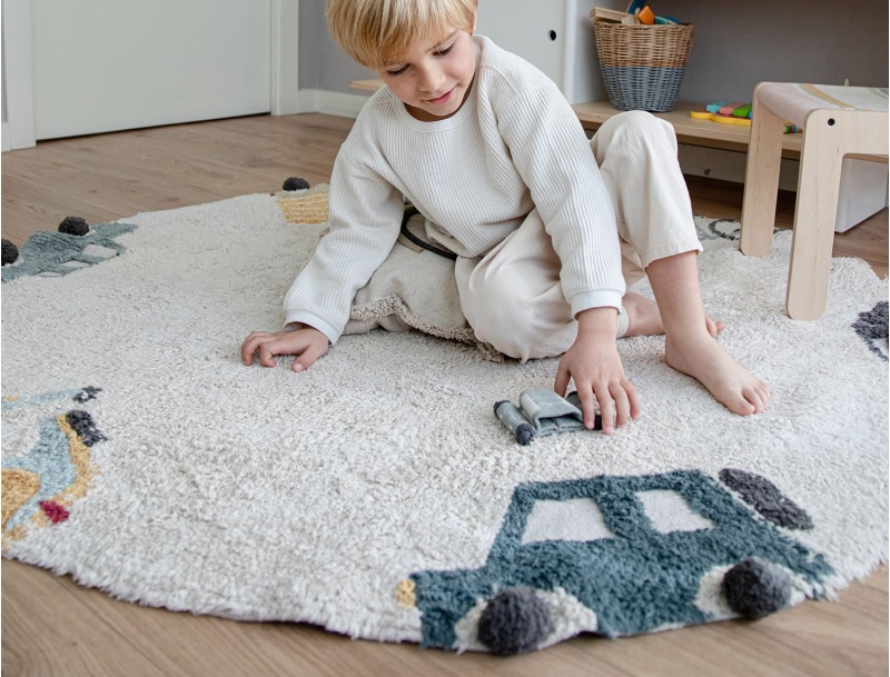 Tappeto rotondo giocoso per bambini in cotone lavabile in lavatrice.
