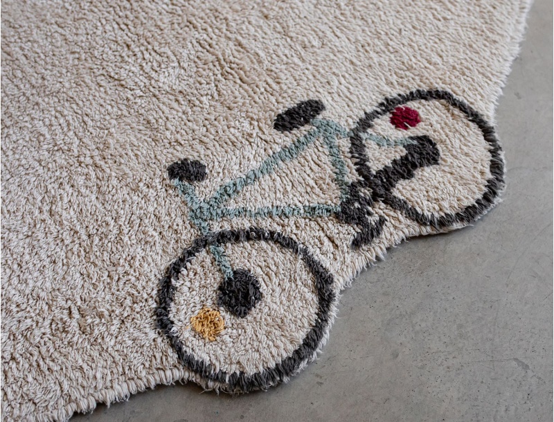Speels rond katoenen tapijt