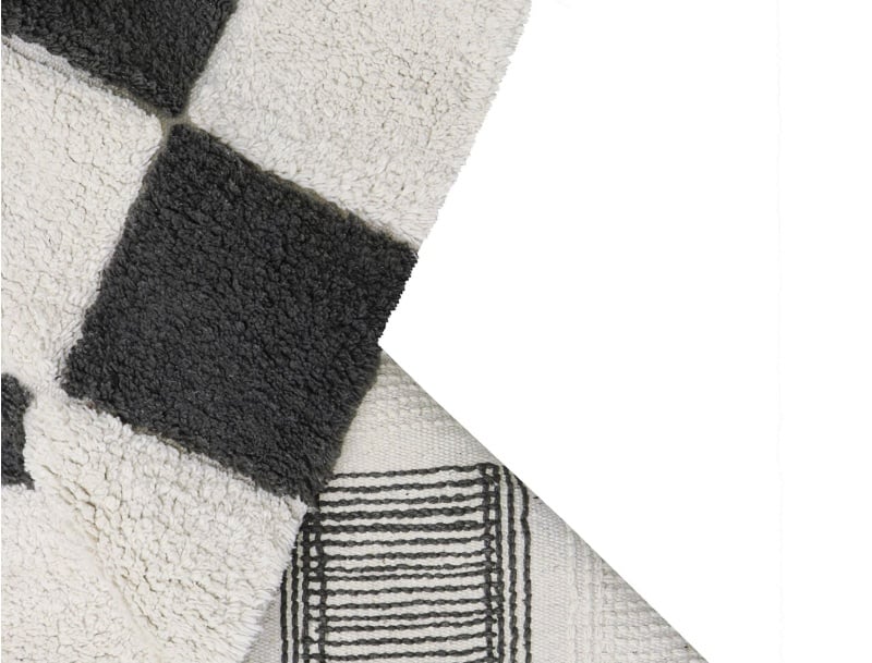 Tapis damier noir et blanc lavable en machine.