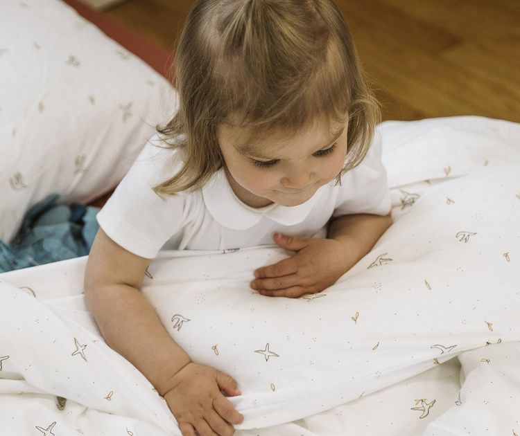 chambrekids-article-de-blog-a-quel-age-passer-a-la-couette-bebe-commen-savoir-quand-son-enfant-est-pret